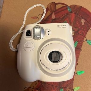 Fuji Instant Camera. Hardly used.